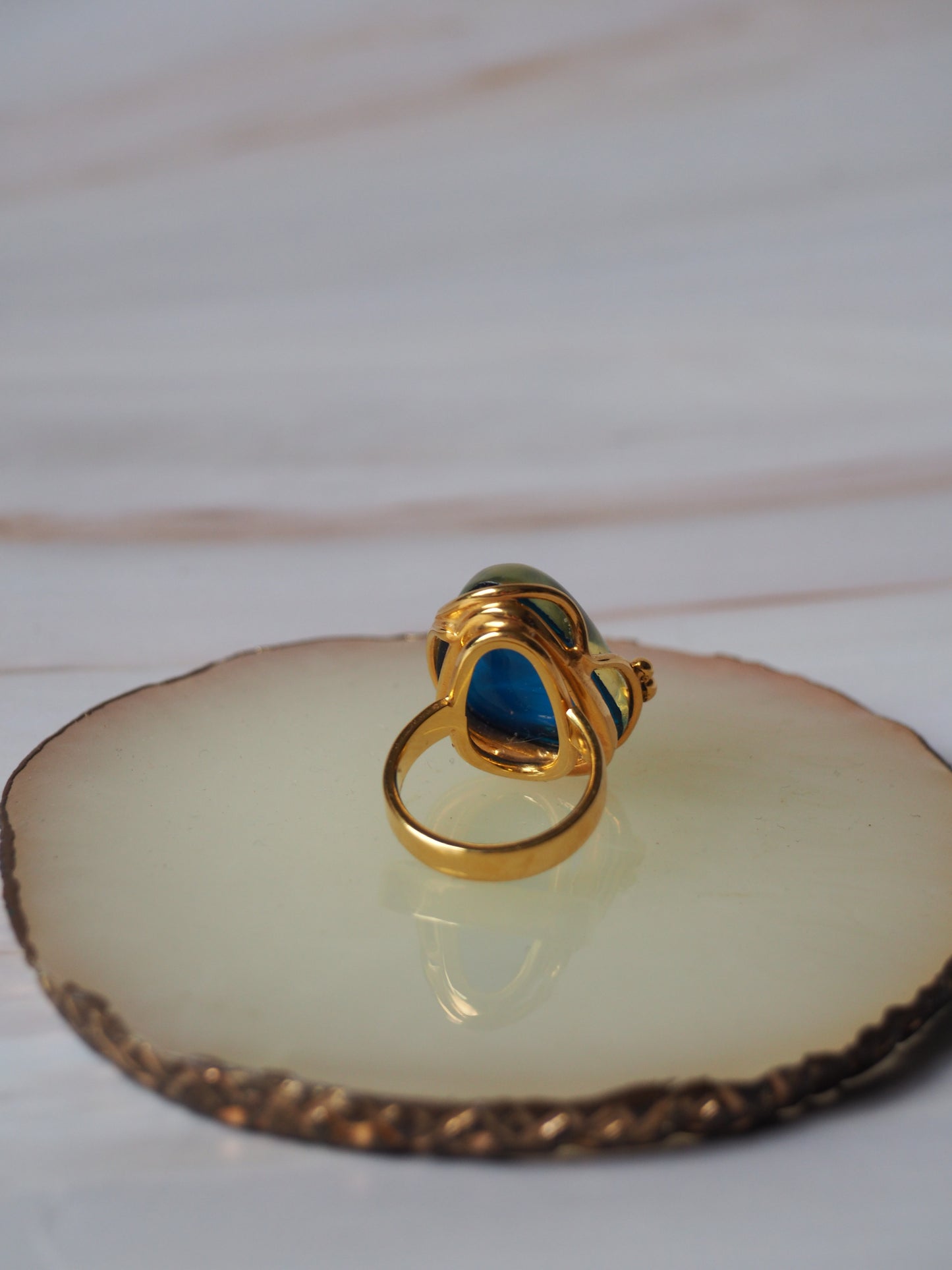 Unique Blue Amber Ring with Milk Inclusion in Gold Plated Silver