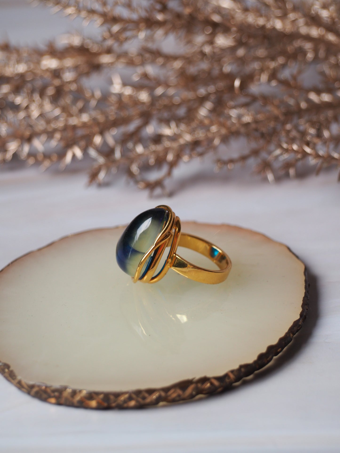 Unique Blue Amber Ring with Milk Inclusion in Gold Plated Silver