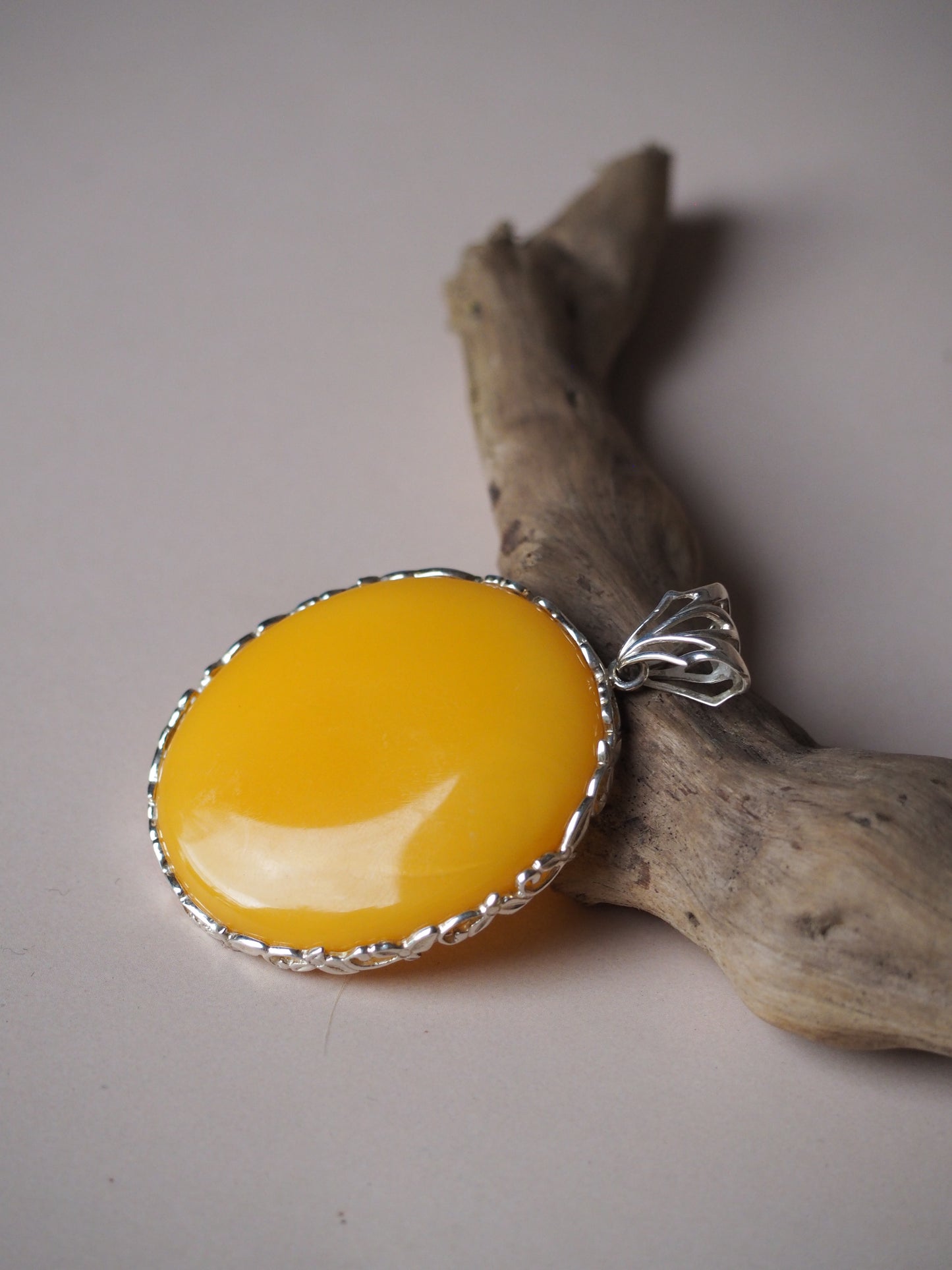 Round Natural Butterscotch Amber Pendant in Silver