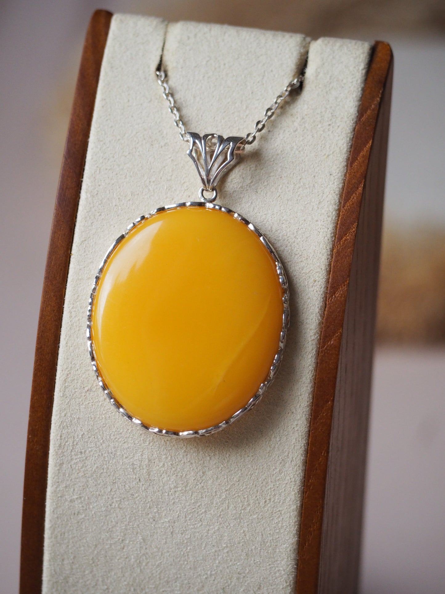Round Natural Butterscotch Amber Pendant in Silver