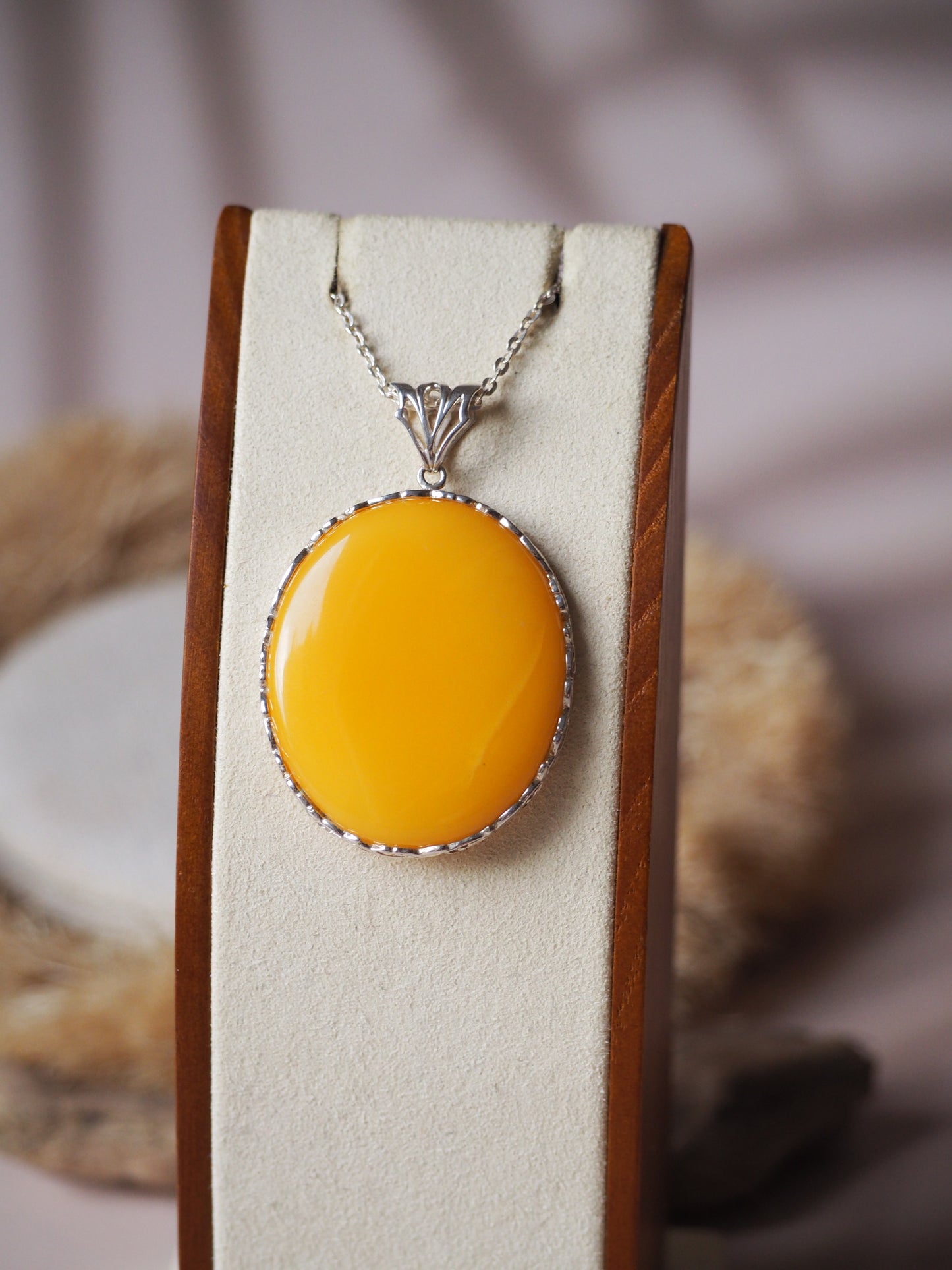 Round Natural Butterscotch Amber Pendant in Silver