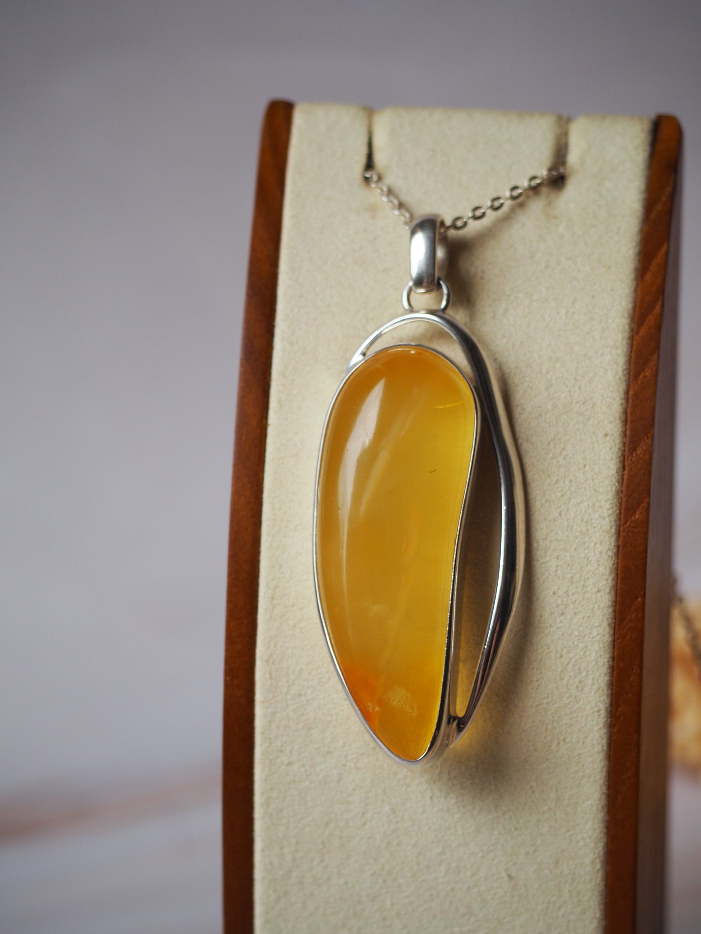 Long Butterscotch Amber Pendant in Silver