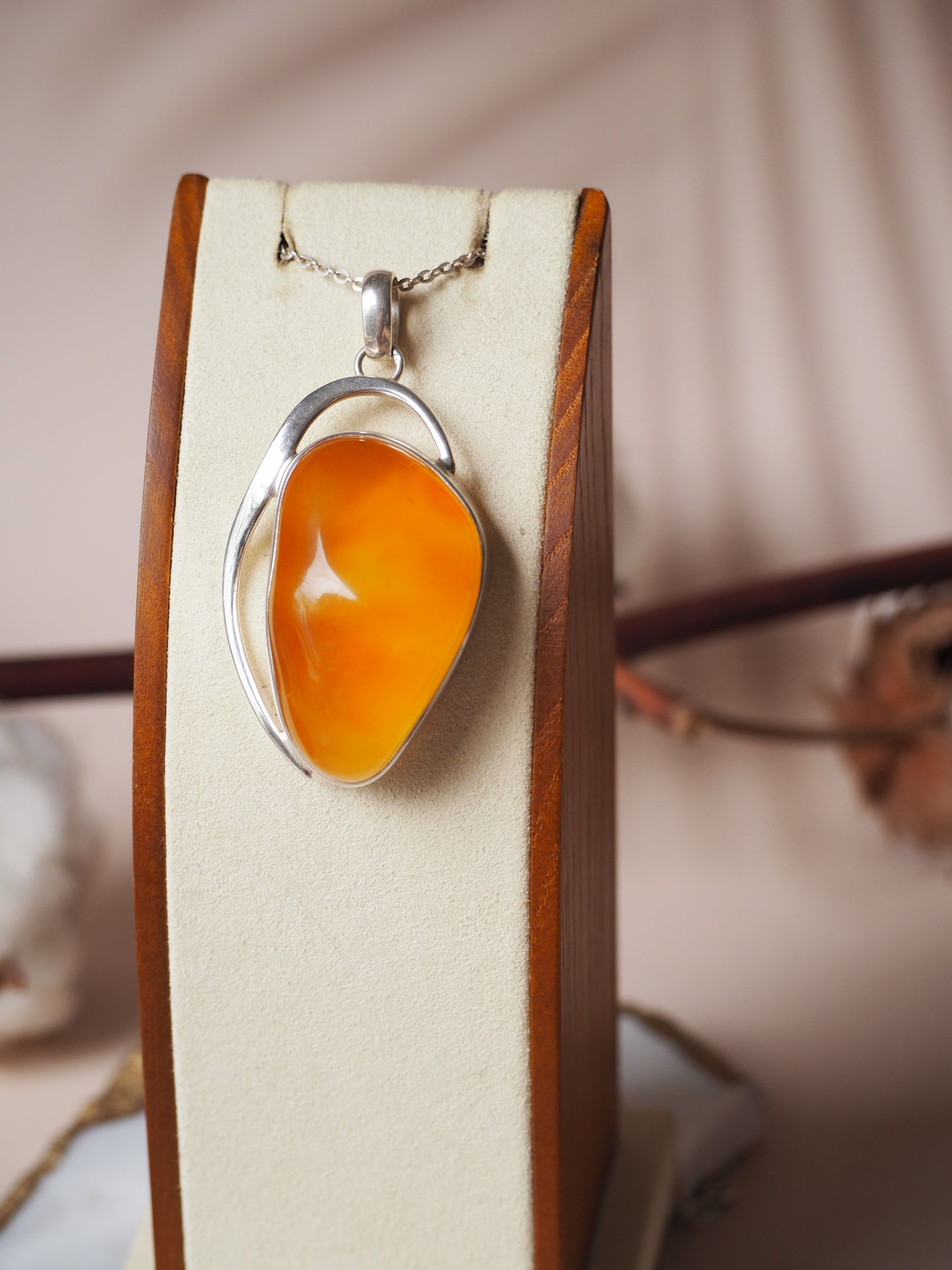 Natural Honey Amber Pendant in Silver Frame