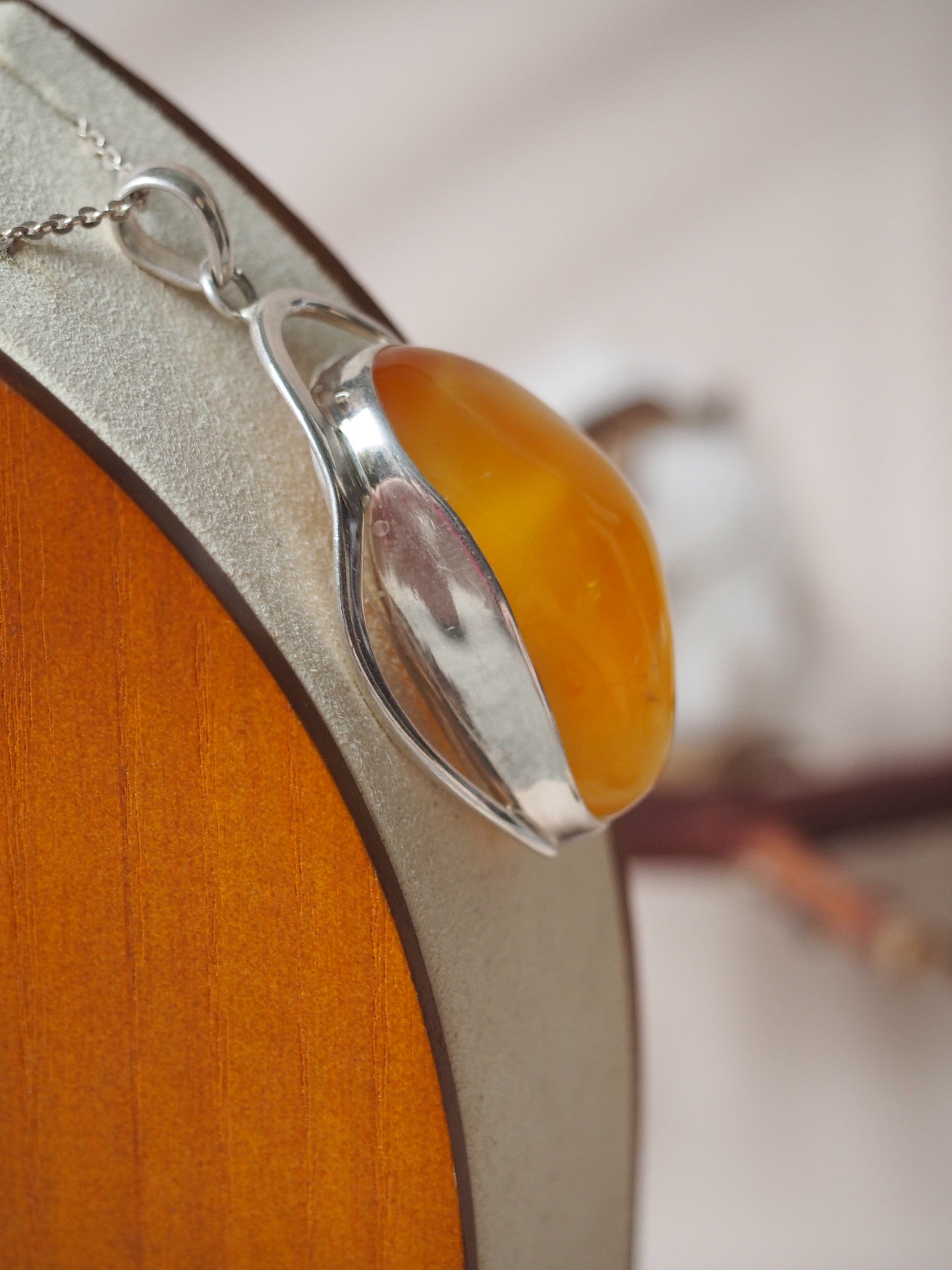 Natural Honey Amber Pendant in Silver Frame