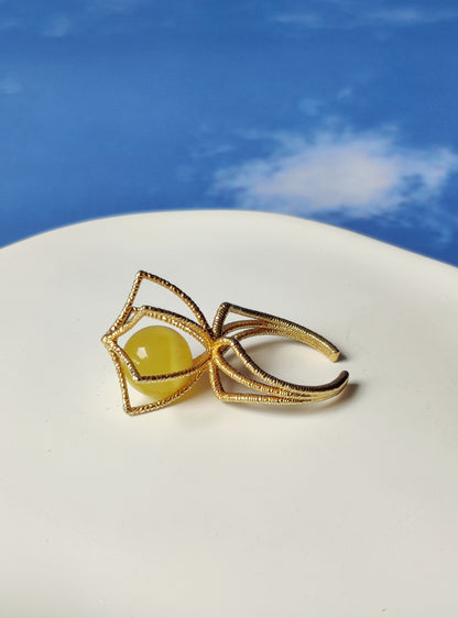 Geometric Cage Ring With Butterscotch Amber And Gold Plated Silver