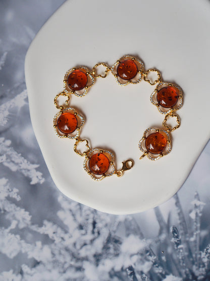 Delicate Flower Shaped Cognac Amber Bracelet with Cubic Zirconia in Gold Plated Silver