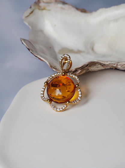 Delicate Flower Shaped Cognac Amber Pendant with Cubic Zirconia in Gold Plated Silver