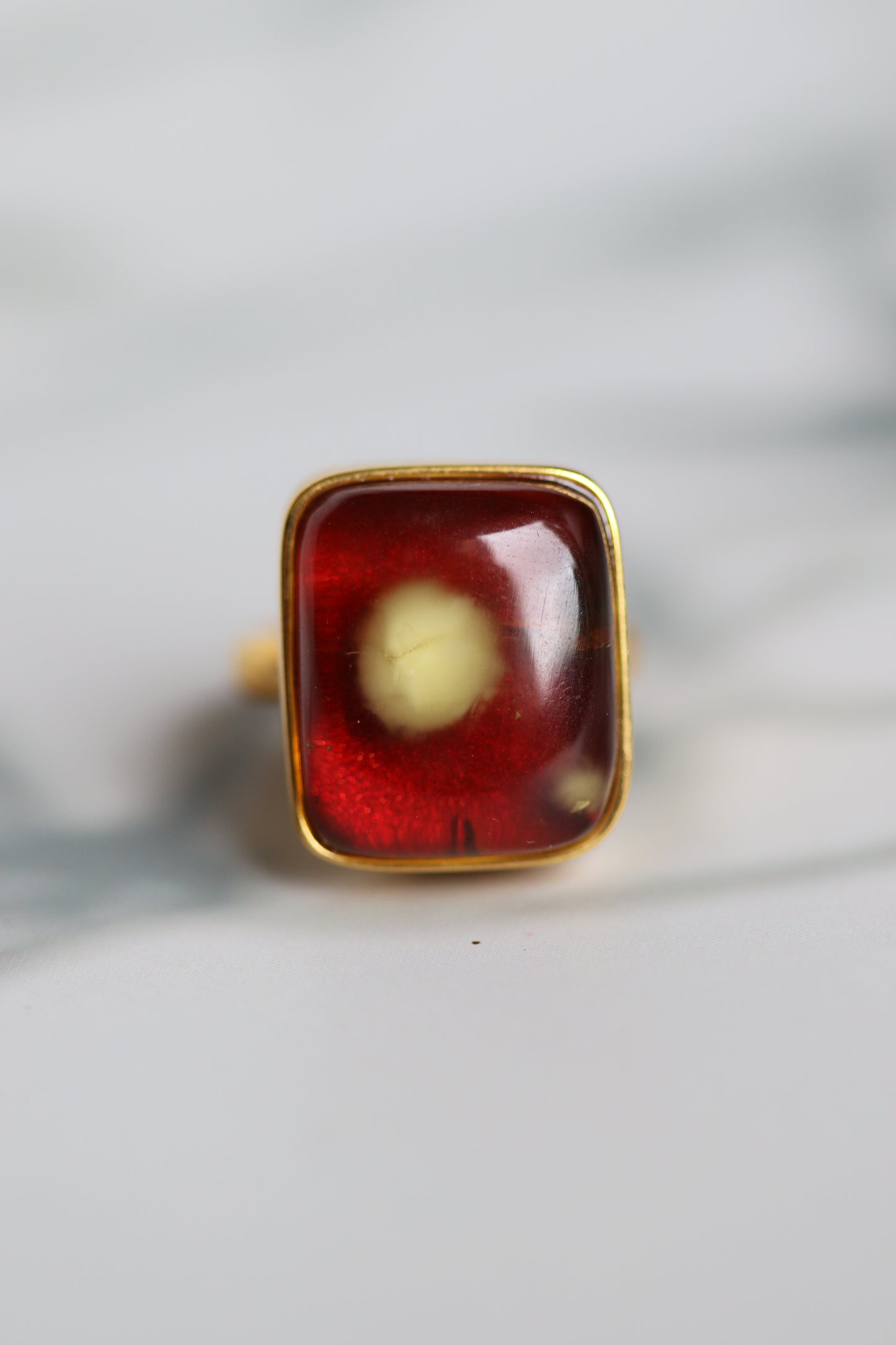 Square Shape Red Amber Ring With Natural Milk Inclusion in Gold Plated Silver Frame