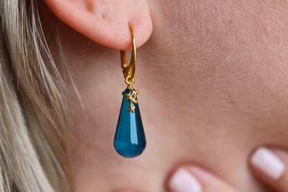 Blue Tear Shaped Amber Earrings in Gold Pleated Silver