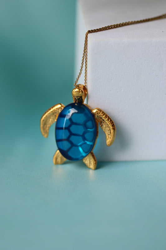 Blue Amber Turtle Shape Pendant in Gold Plated Silver