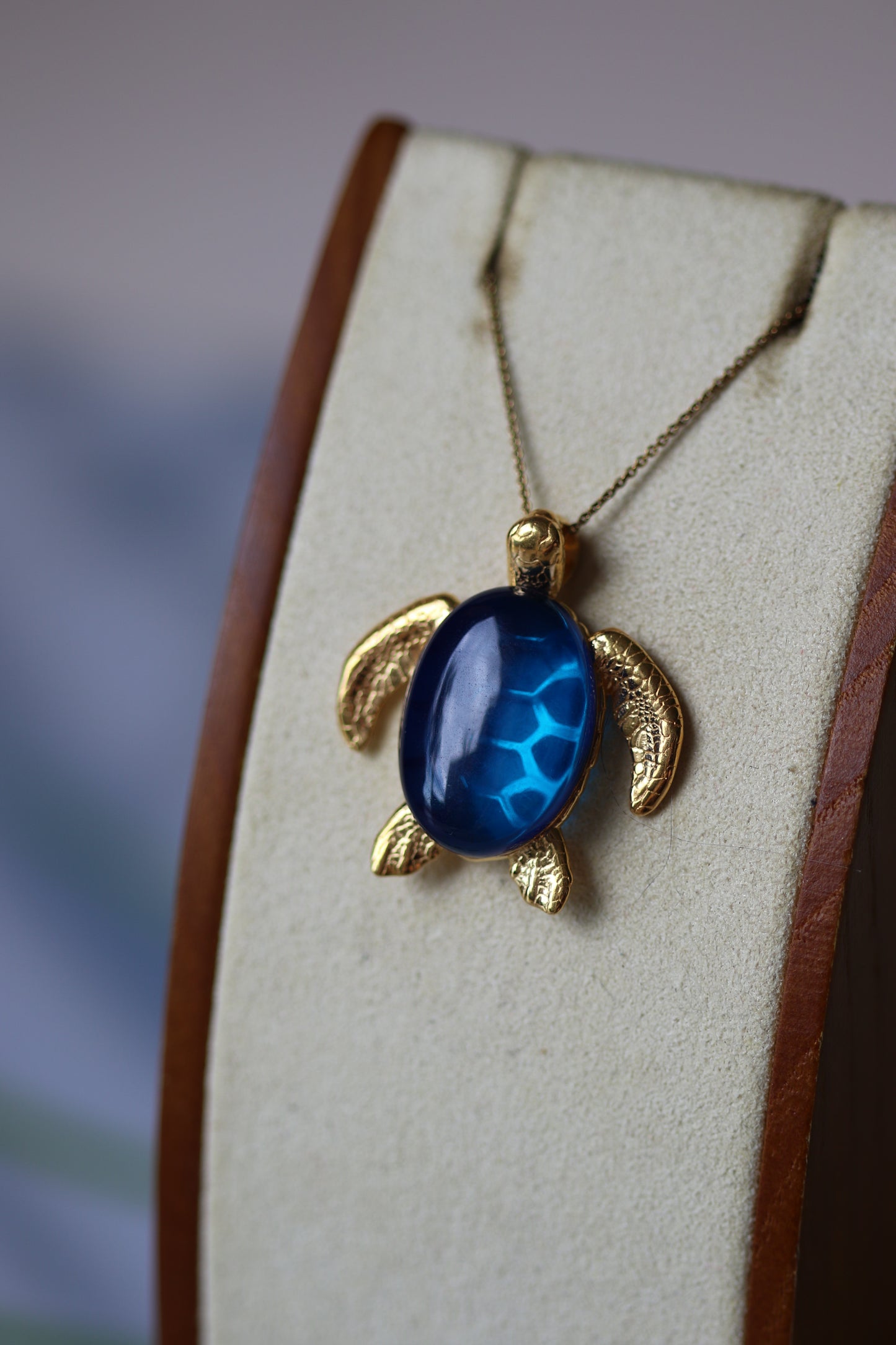 Blue Amber Turtle Shape Pendant in Gold Plated Silver