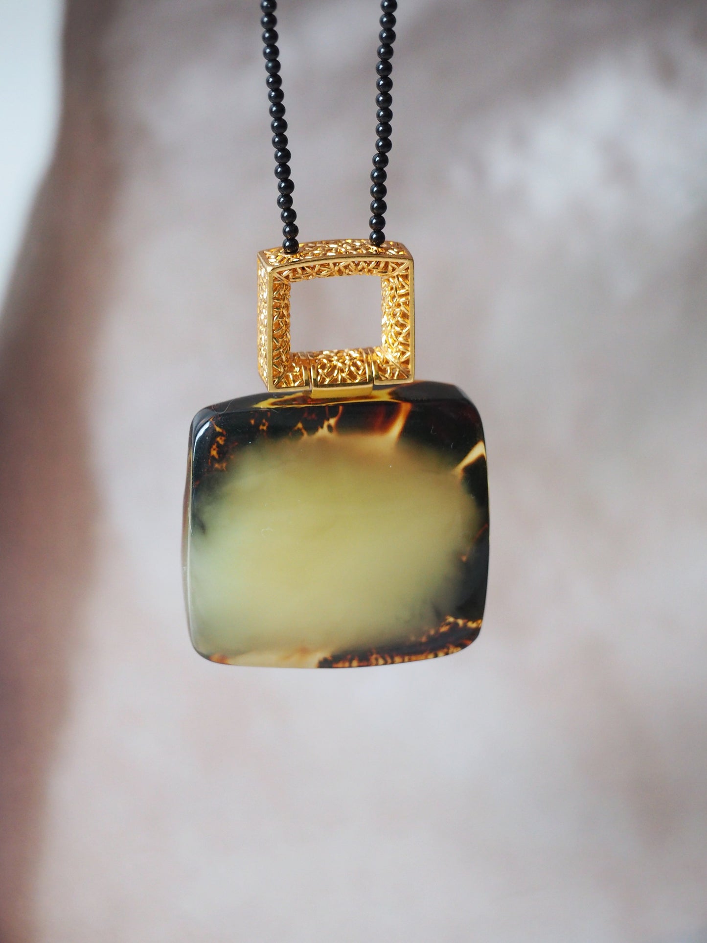 Huge Green Amber Necklace with Black Onyx Necklace and Gold Plated Frame