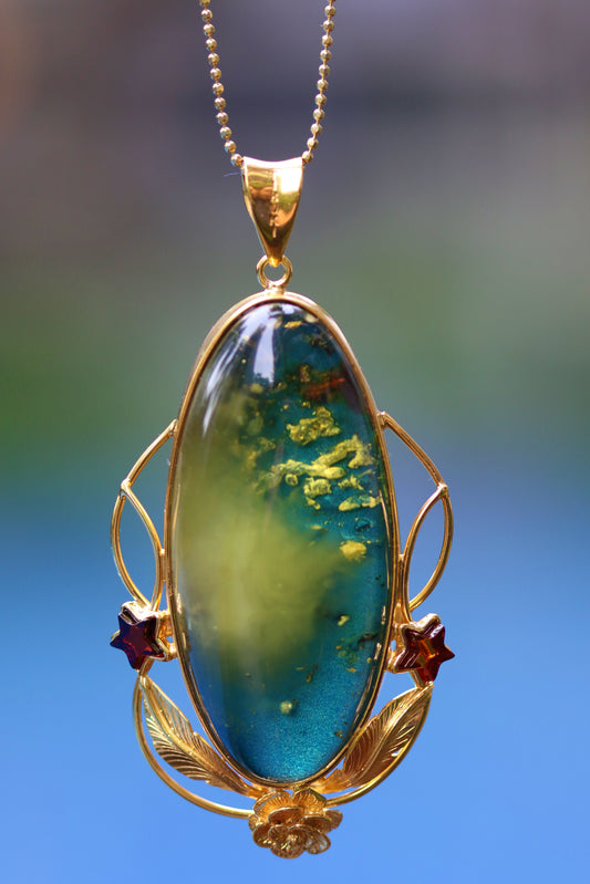 Large Unique Blue Amber Pendant with Milk Cloudy Inclusion and Cognac Stars in Gold Plated Silver