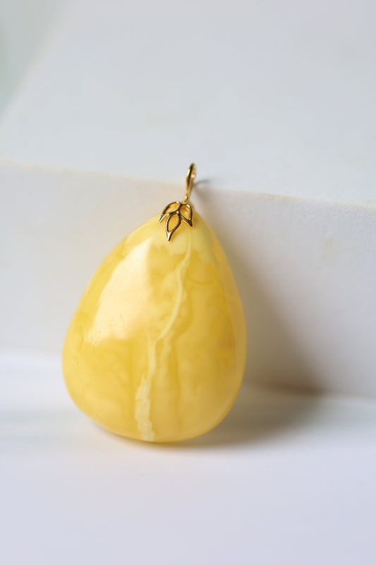 Natural Milk Amber Teardrop Shape Pendant in 14 Carat Gold