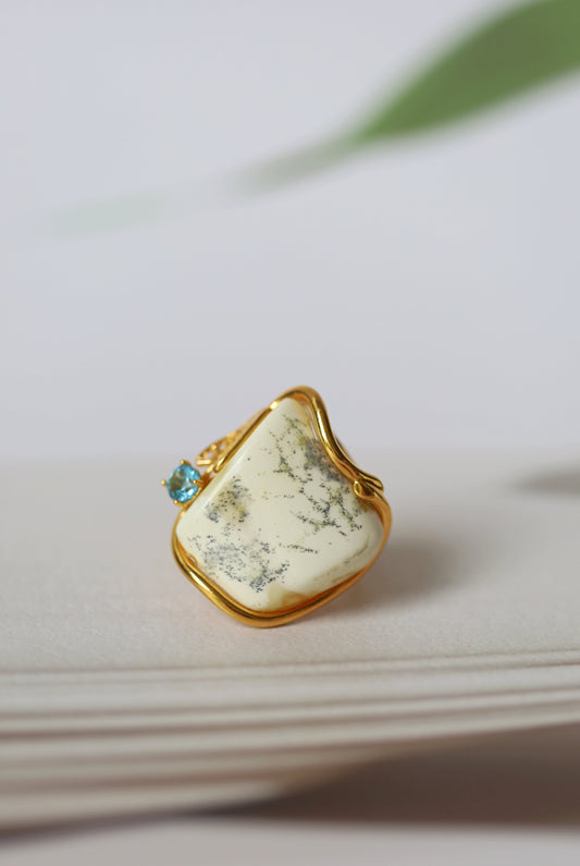 Natural Royal White Irregular Ring With Gold Plated Frame And Blue Topaz