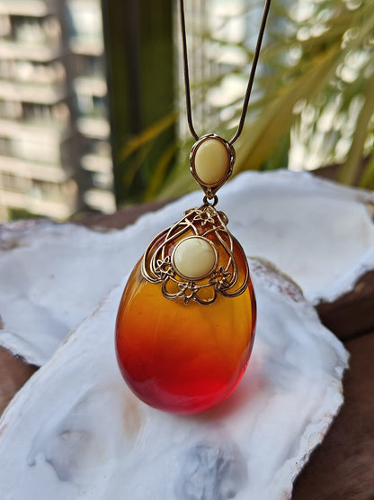 Gradient/ Ombre Red Amber Pendant with Gold Plated Silver and Milk Amber Frame