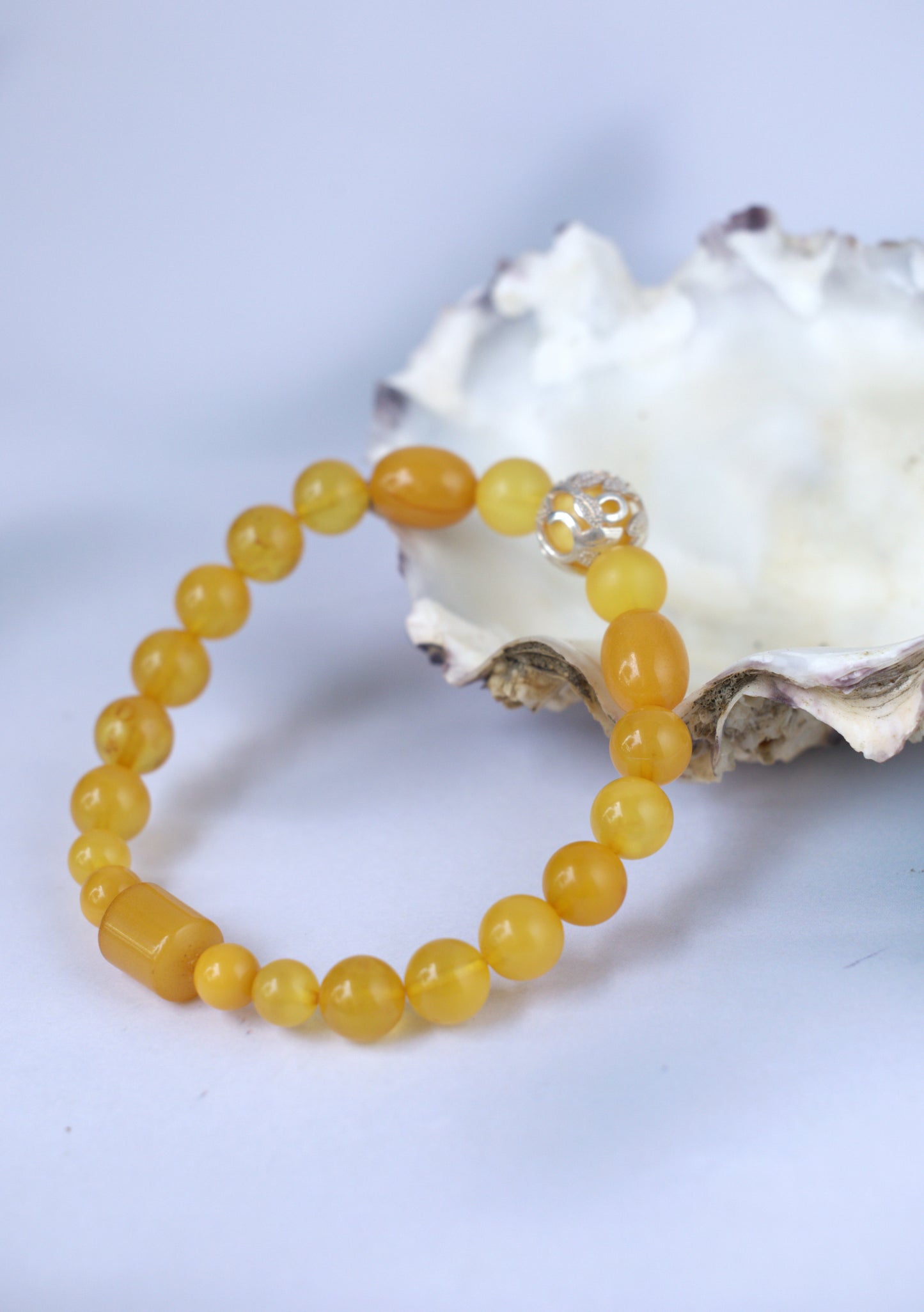 Aged Amber Beaded Bracelet with Silver Leaf Accent