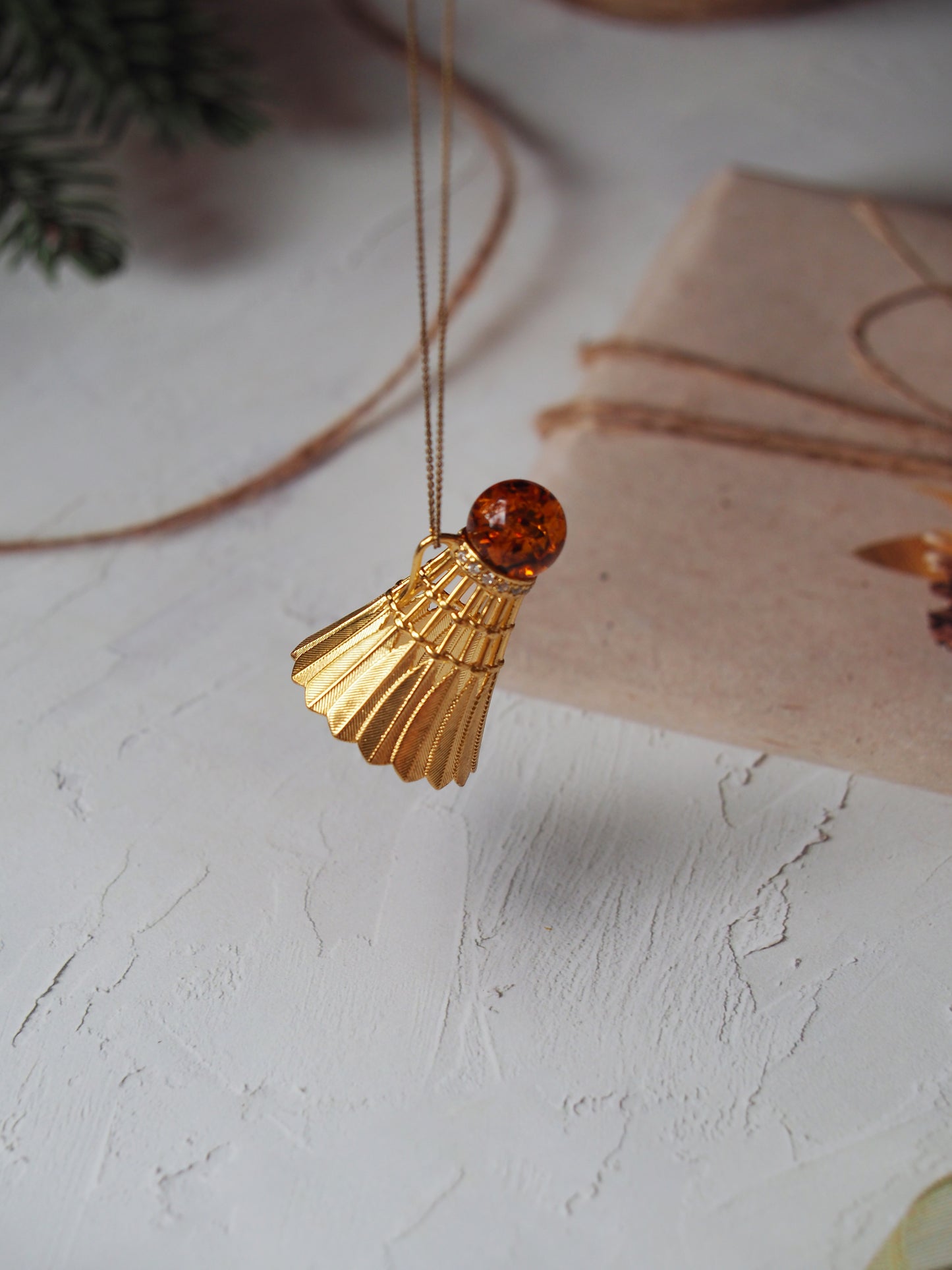 Tennis Shuttlecock Pendant with Cognac Amber in Gold Plated Silver with Cubic Zirconias