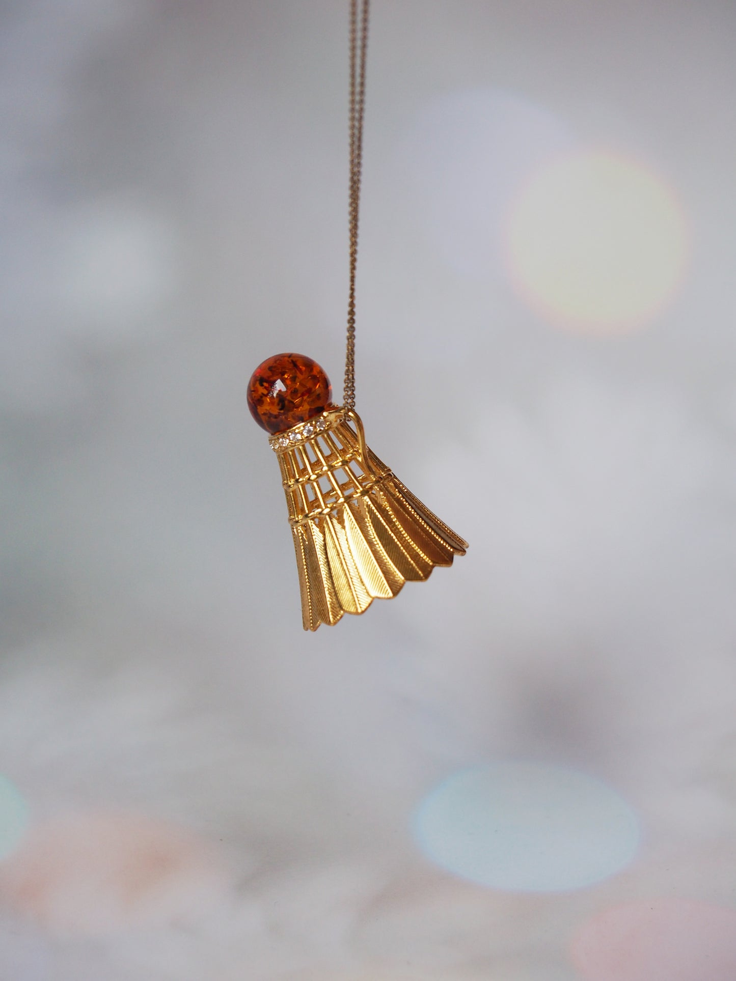 Tennis Shuttlecock Pendant with Cognac Amber in Gold Plated Silver with Cubic Zirconias