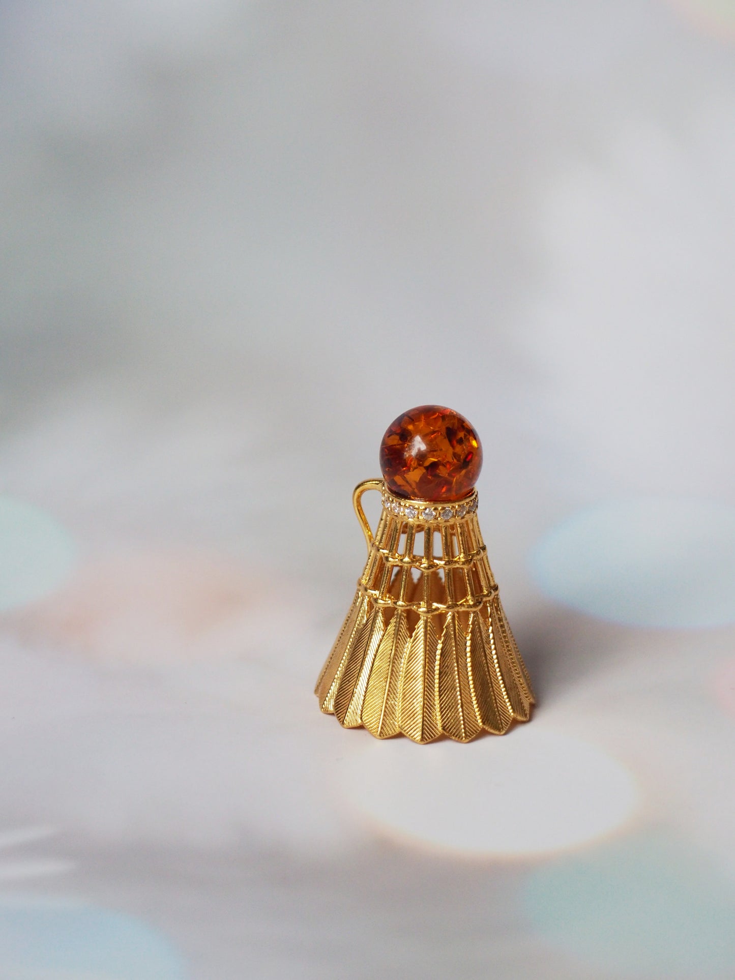 Tennis Shuttlecock Pendant with Cognac Amber in Gold Plated Silver with Cubic Zirconias