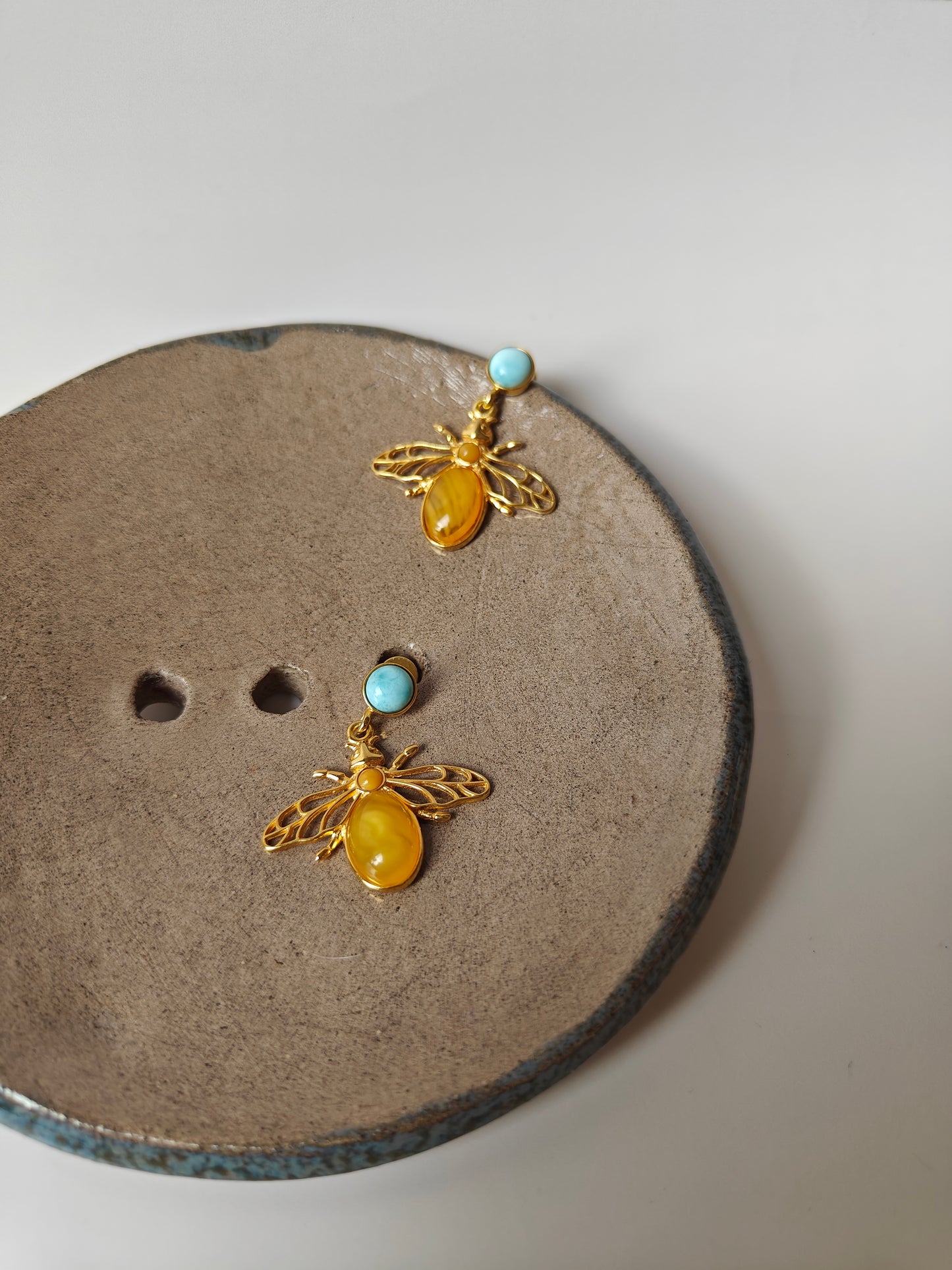 Bee Shaped Butterscotch Amber Stud Earrings with Larimar in Gold Plated Silver Frame