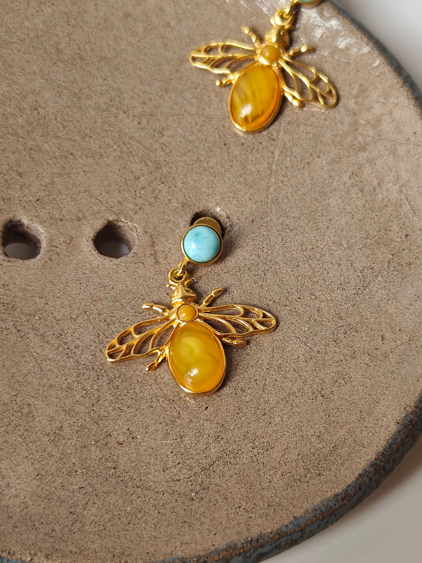 Bee Shaped Butterscotch Amber Stud Earrings with Larimar in Gold Plated Silver Frame