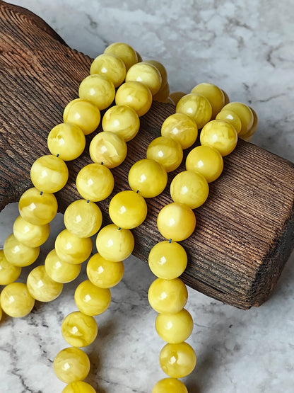 Natural Butterscotch Amber Rosary with Royal White Inclusions 67 Beads