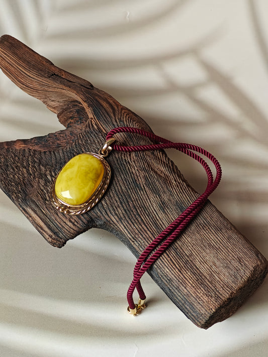 Butterscotch Amber Pendant in Rose Gold Pleated Silver Frame