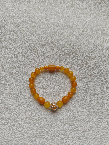 Aged Amber Beaded Bracelet with Silver Leaf Accent