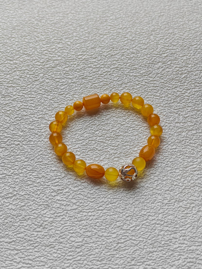 Aged Amber Beaded Bracelet with Silver Leaf Accent