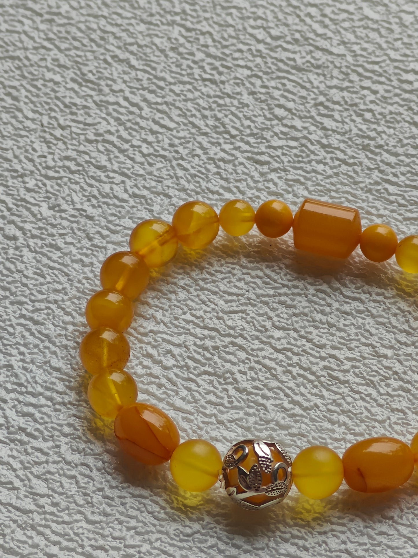 Aged Amber Beaded Bracelet with Silver Leaf Accent