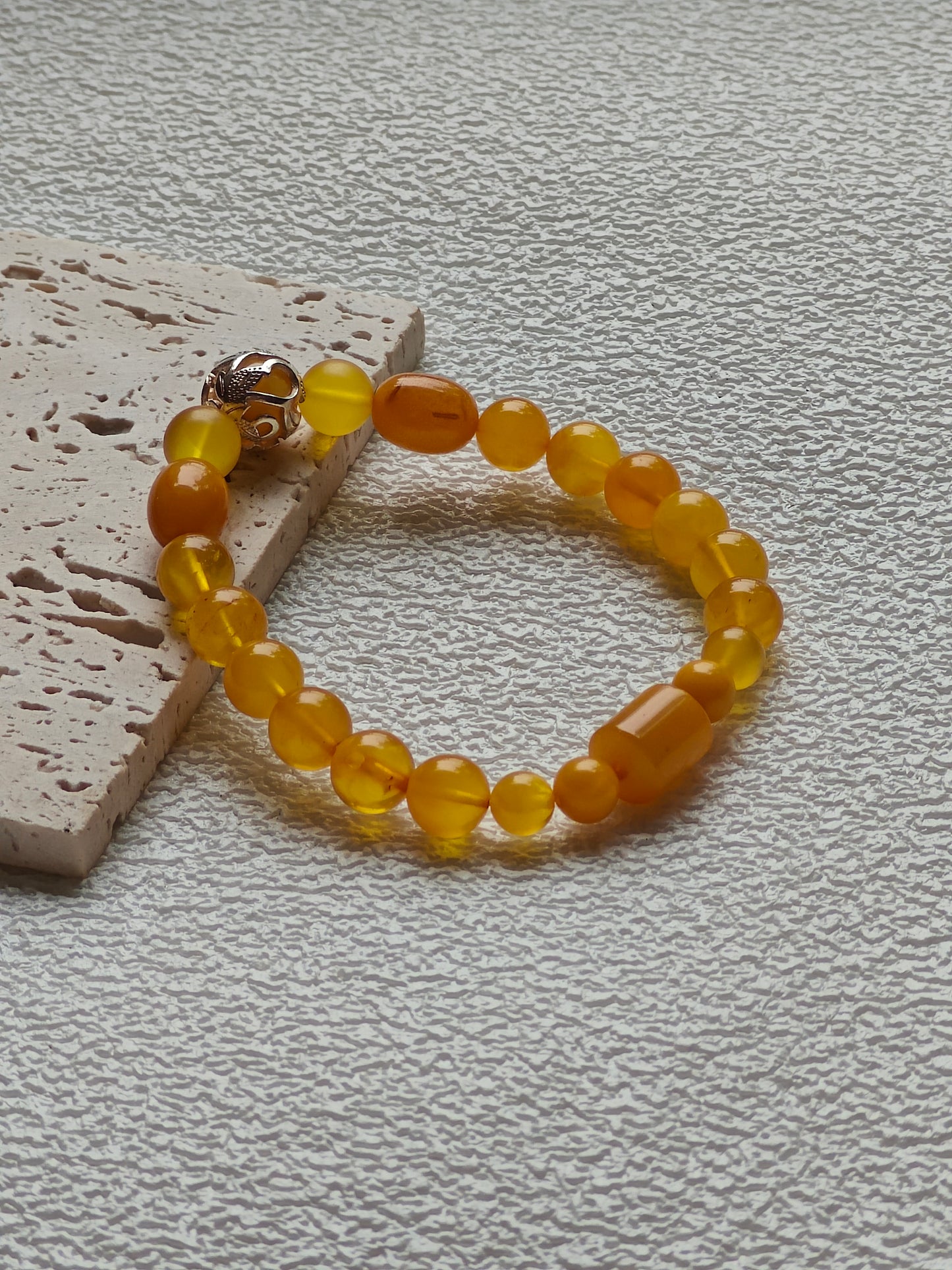 Aged Amber Beaded Bracelet with Silver Leaf Accent