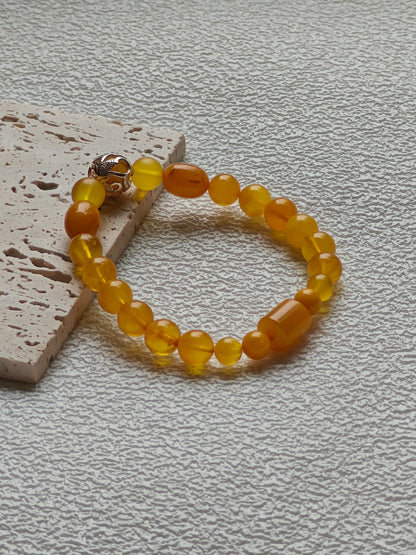 Aged Amber Beaded Bracelet with Silver Leaf Accent
