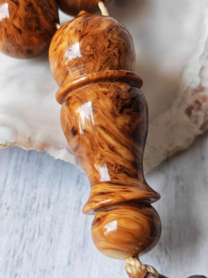 “Savannah Pattern” German Bakelite | 33 Beads | Istanbul Shape | Silver Tassel