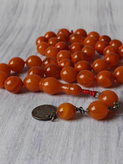 German Bakelite Carvacraft Tasbih – 39 Pigeon-Egg Beads | Turkish Craft | Silver Coin Tassel | Deep Honey Color with Transparent Veins