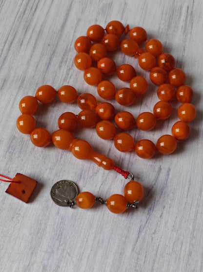 German Bakelite Carvacraft Tasbih – 39 Pigeon-Egg Beads | Turkish Craft | Silver Coin Tassel | Deep Honey Color with Transparent Veins