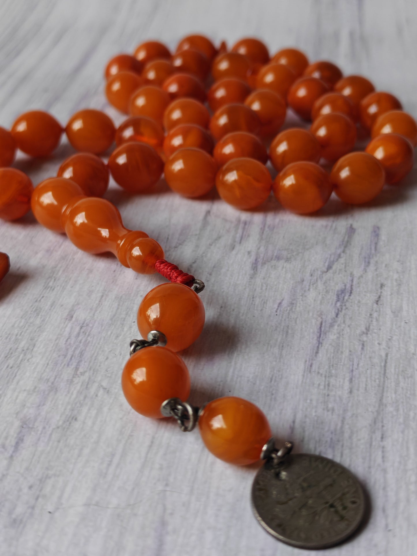 German Bakelite Carvacraft Tasbih – 39 Pigeon-Egg Beads | Turkish Craft | Silver Coin Tassel | Deep Honey Color with Transparent Veins
