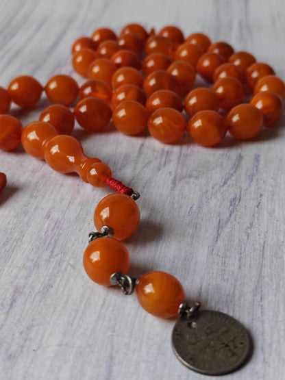 German Bakelite Carvacraft Tasbih – 39 Pigeon-Egg Beads | Turkish Craft | Silver Coin Tassel | Deep Honey Color with Transparent Veins