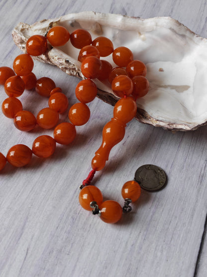 German Bakelite Carvacraft Tasbih – 39 Pigeon-Egg Beads | Turkish Craft | Silver Coin Tassel | Deep Honey Color with Transparent Veins