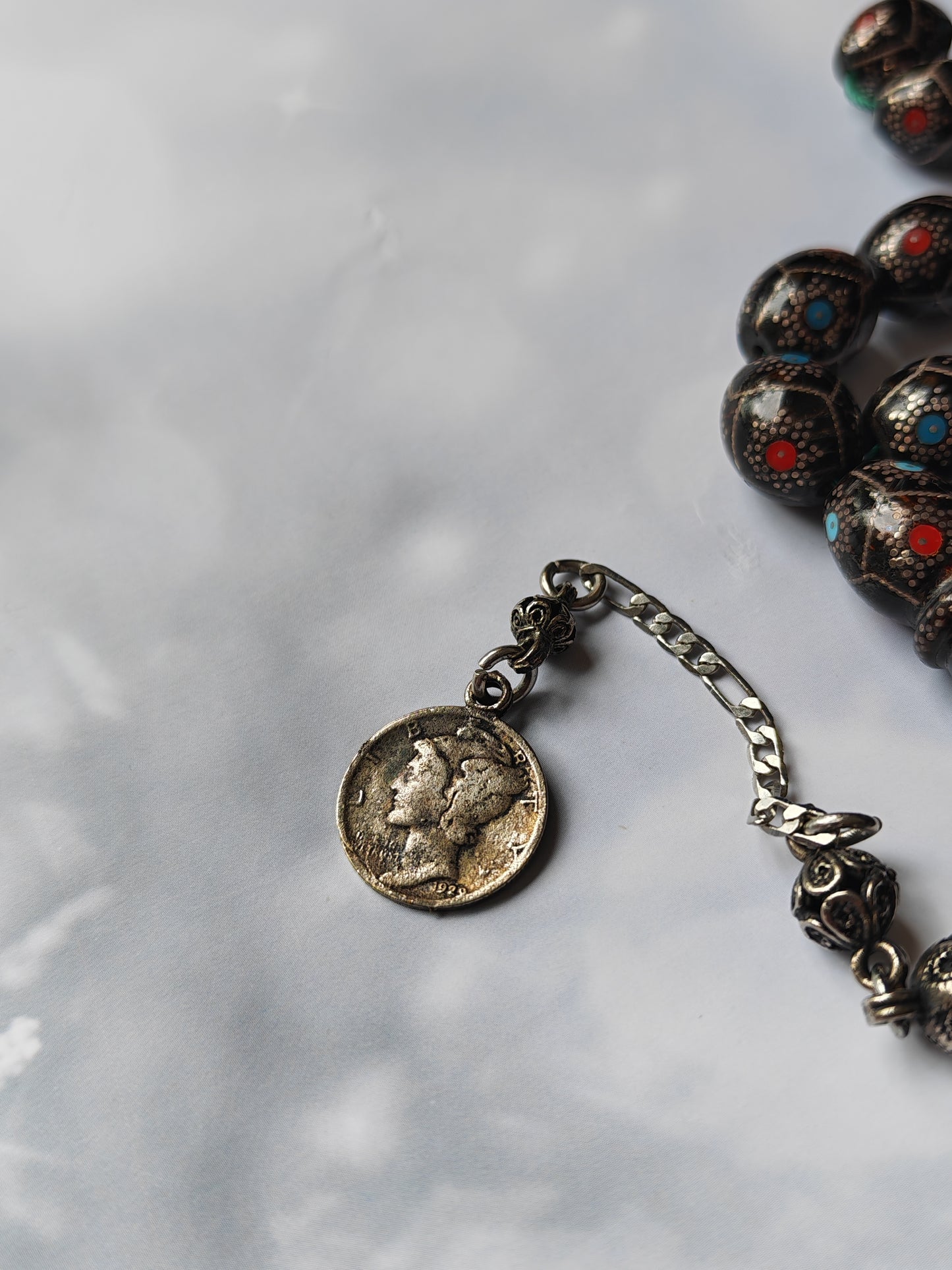 Black Coral Tasbih | Olive-Shaped Beads with Enamel & Silver Mosaic | Ahmed Alfar