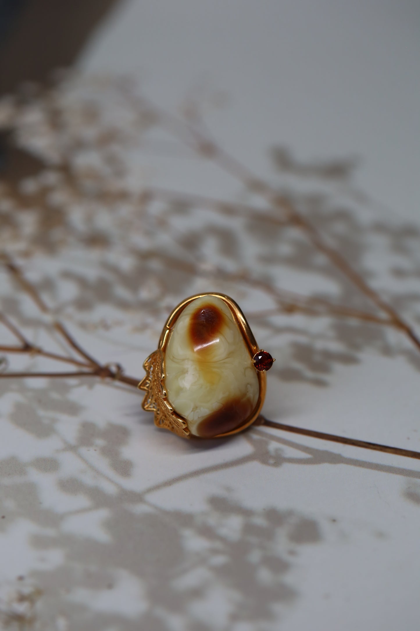 Natural Royal White Irregular Ring With Gold Plated Frame And Red Garnet