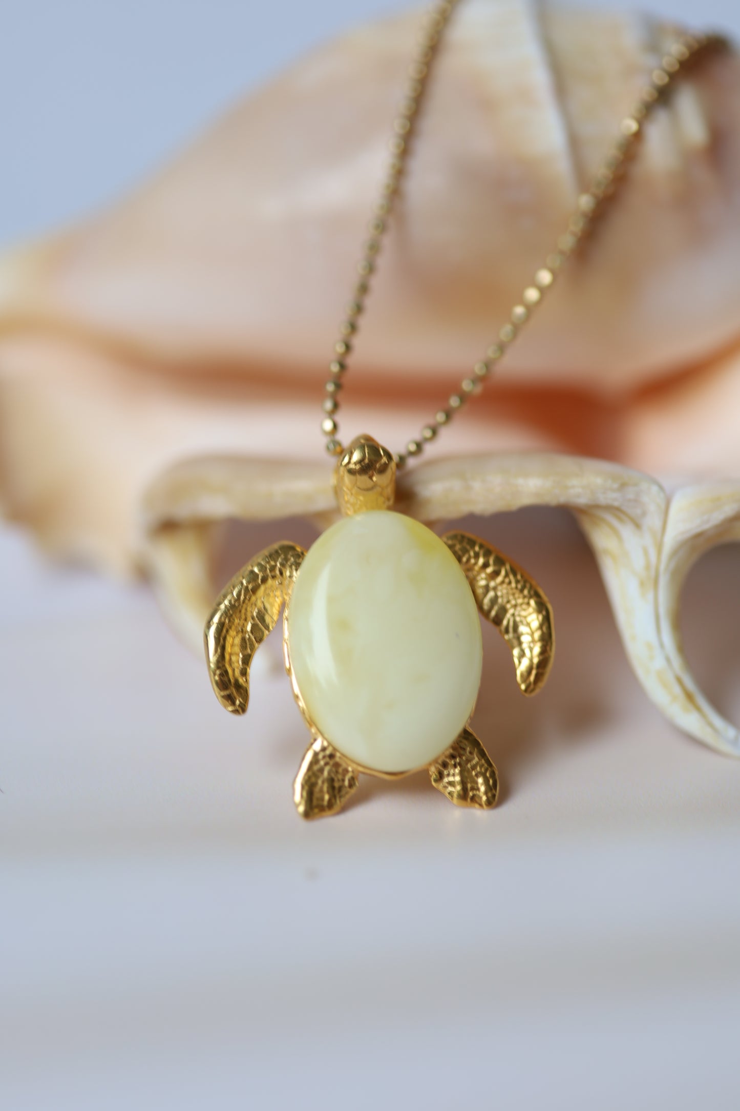 Royal White / Milk Amber Turtle Shape Pendant in Gold Plated Silver 925