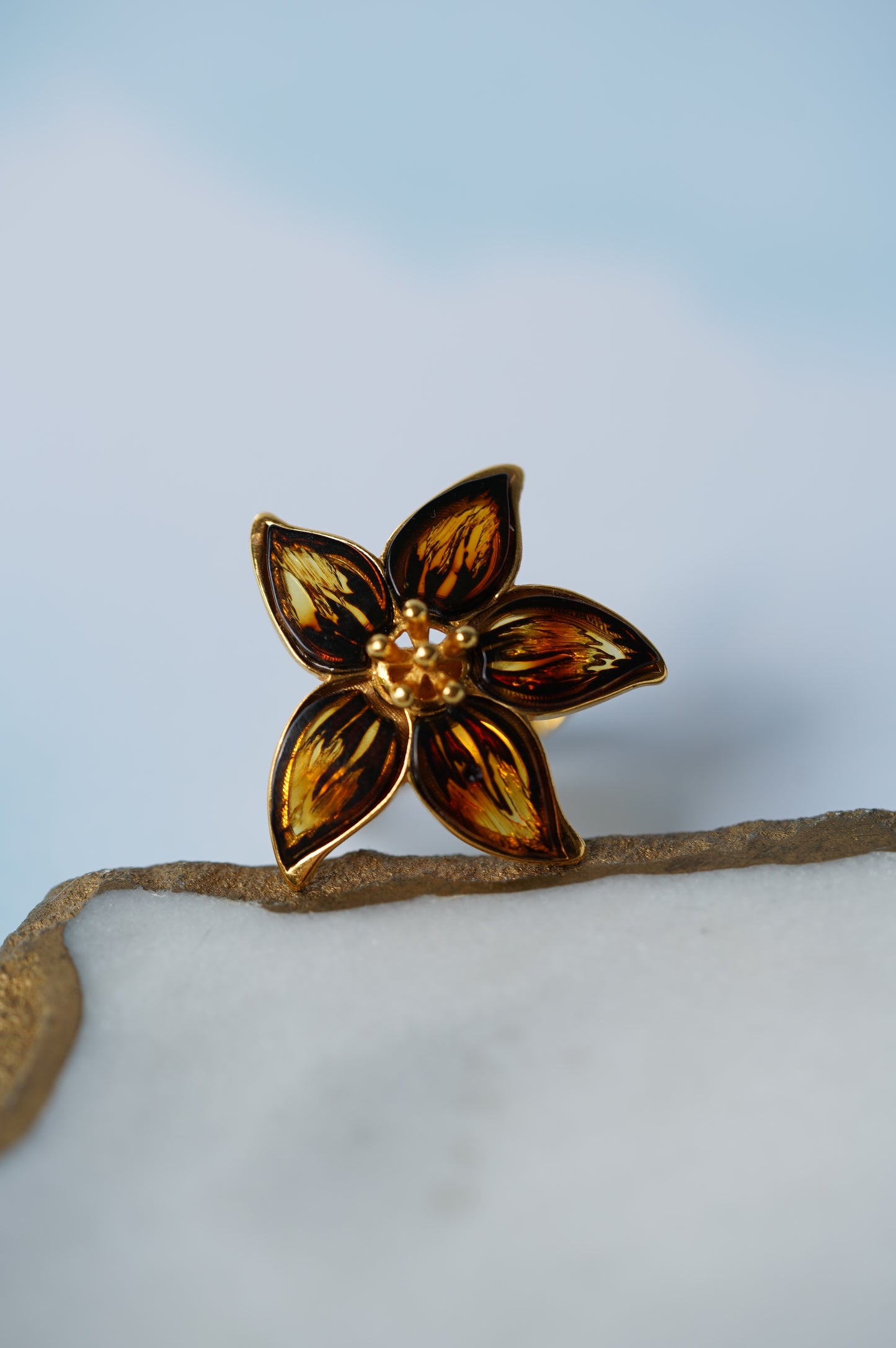 Flower Shaped Cognac Amber Ring With Gold Plated Silver Frame