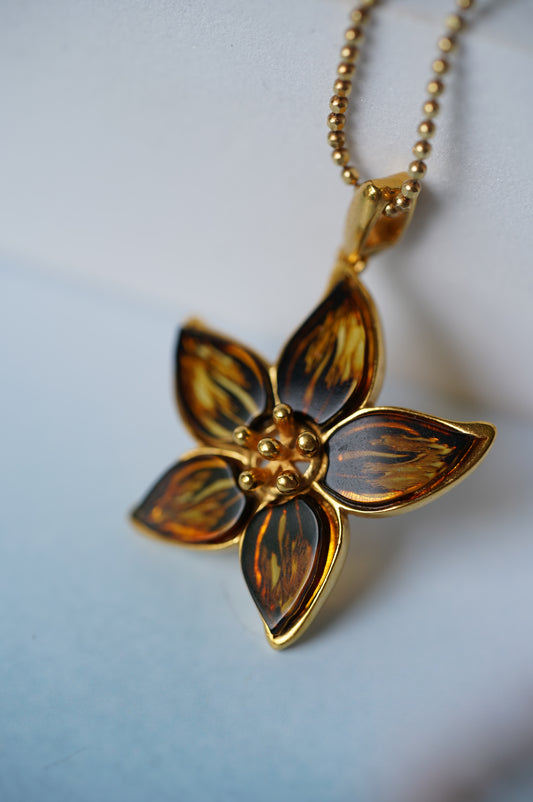 Flower Shaped Cognac Amber Pendant With Gold Plated Silver Frame