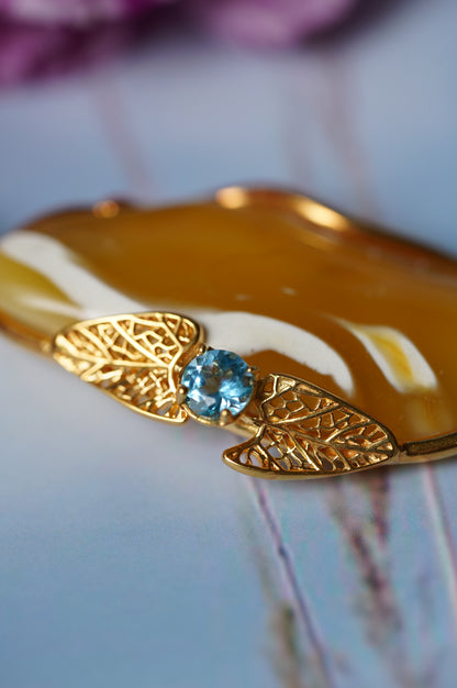 Natural Irregular Honey / Royal White Amber Pendant in Gold Plated Silver Frame with Blue Topaz