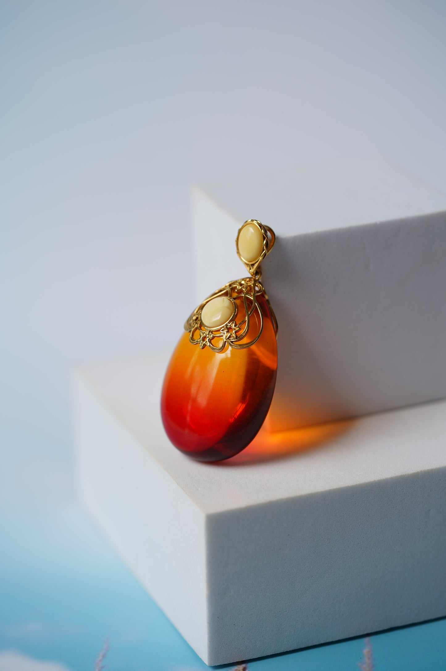 Gradient/ Ombre Red Amber Pendant with Gold Plated Silver and Milk Amber Frame