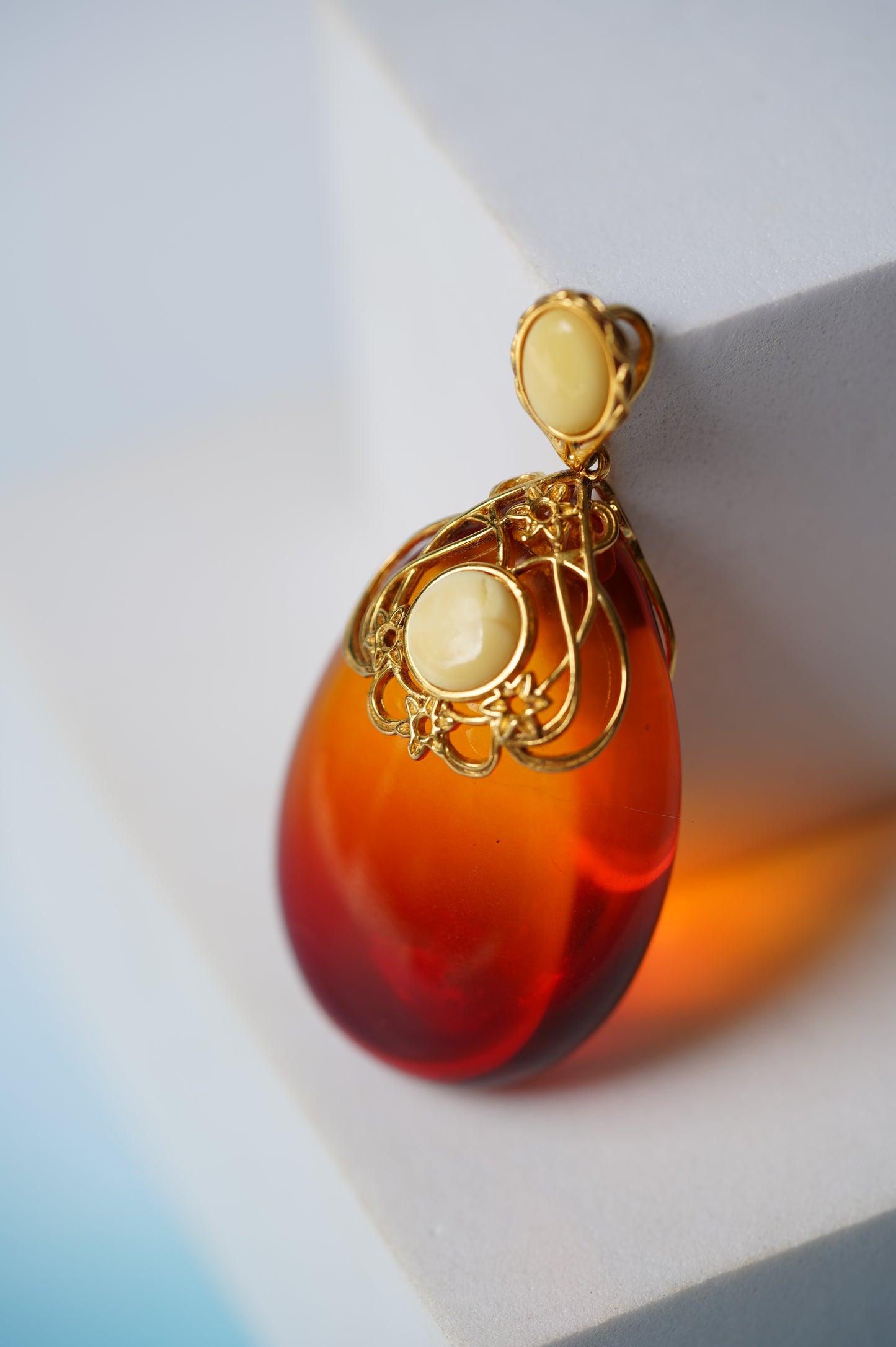 Gradient/ Ombre Red Amber Pendant with Gold Plated Silver and Milk Amber Frame