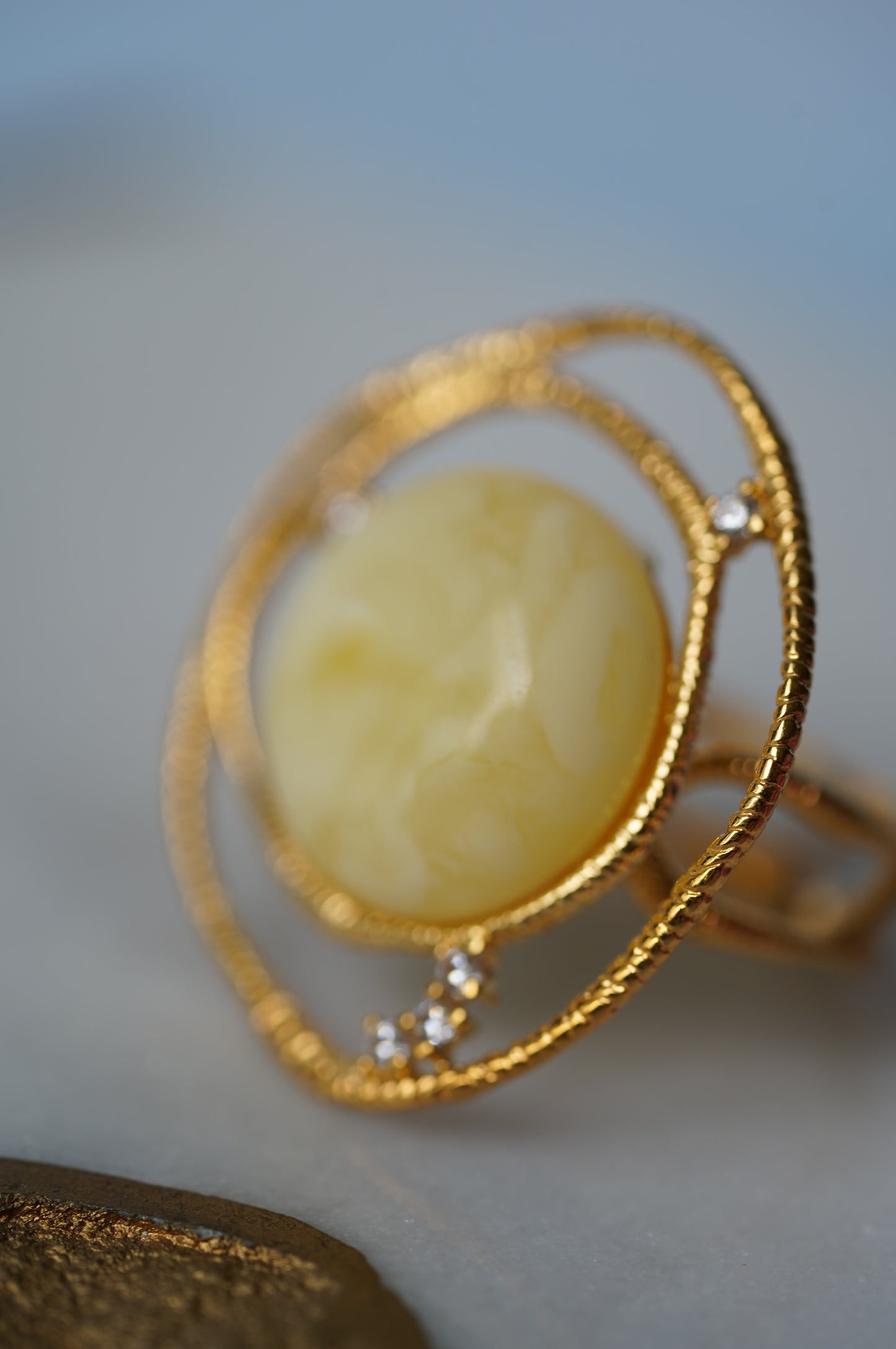 Delicate Round Irregular Royal White Amber Ring with Cubic Zirconias in Gold Plated Silver