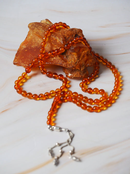 Cognac Raw Amber Piece and Rosary Made of of It with Silver Tassel | 90,5g