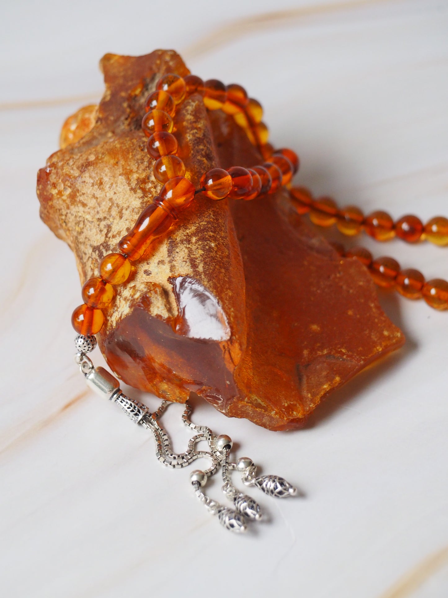 Cognac Raw Amber Piece and Rosary with Silver Tassel | 90,5g